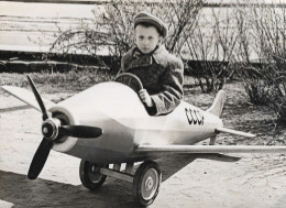 A Small Boy With A Flat Cap In A Life-like Toy Aeroplane CCCP, Soviet Russia USSR 1960-70s Original Vintage Photo - Aviation