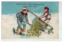 HERZLICHE #16467 JOYEUX NOEL 2 ENFANTS RENVERSANT UNE BROUETTE DE TREFLES CARTE GAUFREE + CACHET MILITAIRE COLMAR - New Year