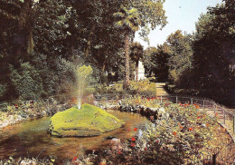 *CPM - 34 - LUNEL-  Le Jardin Public Et Son Jet D'eau - Lunel