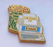 G469 Pin's Canon Imprimante Signé Arthus Bertrand Achat Immédiat - Arthus Bertrand