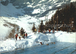 11687054 Leukerbad Thermalschwimmbad Im Schnee Leukerbad - Autres & Non Classés