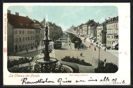 AK La Chaux De Fonds, Rue Léopold-Robert, Strassenbahn Und Springbrunnen  - Tramways