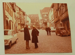 Woman And Man On The Street, Parked Cars, Citroen Car, City Of Riquewihr, Alsace, France-March 1978. - Orte