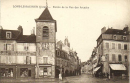 LONS LE SAUNIER Entrée De La Rue Des Arcades Animée Commerces  RV - Lons Le Saunier