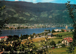 73304363 Ossiach Panorama Blick Ueber Den See Nach Bodensdorf Ossiach - Altri & Non Classificati