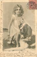 UNE FILLETTE ET SON CHIEN - Cani