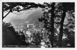 63 LE MONT DORE Vue Générale à Travers Les Arbres Carte écrite  édition CAP (Scans R/V) N° 57 \MO7041 - Le Mont Dore