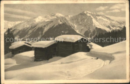 11661116 Klosters GR Blockhuetten Winterpanorama Klosters - Autres & Non Classés