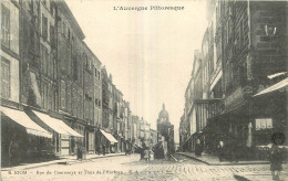 63 - RIOM - RUE DU COMMERCE ET TOUR DE L'HORLOGE - E.A. - 6 - Riom