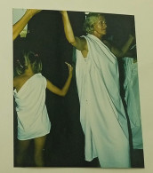 Performance Of A Young Girl And A Woman In White - Anonieme Personen