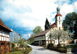 73269039 Grossschoenau Sachsen Ortsmotiv Mit Kirche Baumbluete Umgebindehaeuser  - Grossschoenau (Sachsen)