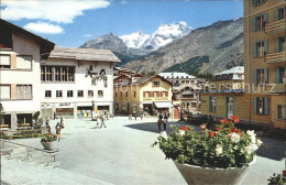 11651928 Saas-Fee Dorfplatz Mit Fletschhorn Und Laquinhorn Walliser Alpen Saas-F - Other & Unclassified