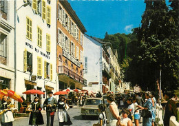 Automobiles - Les Eaux Bonnes - Le Centre. Les Hôtels - CPM - Voir Scans Recto-Verso - Passenger Cars