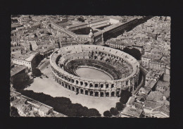 CPSM Dentelée - 30 - Nimes - Vue Aérienne Sur Les Arènes - Circulée En 1964 - Nîmes