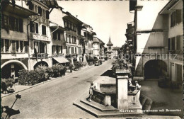 11646928 Murten Morat Hauptstr Mit Bernertor Brunnen Murten Morat - Sonstige & Ohne Zuordnung