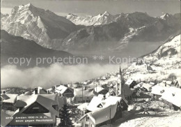 11645618 Amden SG Ortsansicht Mit Kirche Nebelmeer Rautistock Alpenpanorama Betl - Andere & Zonder Classificatie