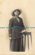 R039815 Old Postcard. Woman With Hat Near The Table. A. Lawton Jones - World