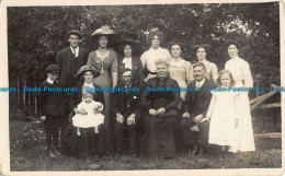 R039816 Old Postcard. Family Portrait - World