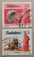 Zimbabwe 2 Timbres Artisanat Oblitérés - Zimbabwe (1980-...)