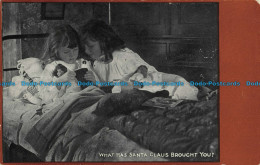 R042844 What Has Santa Claus Brought You. Girls. Marcus Wards. 1903 - World