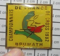 1818B Pin's Pins / Beau Et Rare / ATHLETISME / BRUMATH CHAMPIONNATS DE FRANCE DE CROSS 1992 BAS-RHIN - Atletismo