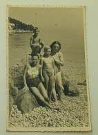 Little Girl, Boy, Young Girl And Woman On The Beach - Anonymous Persons