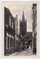 39074707 - Emden Mit Alte Gasse An Der Grossen Kirche Gelaufen, 1944. Leicht Buegig, Leichter Stempeldurchdruck, Sonst  - Altri & Non Classificati