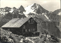 11639173 Oberalpstock Windgaellenhuette Maenner Ziegen Kuehe Oberalpstock - Sonstige & Ohne Zuordnung