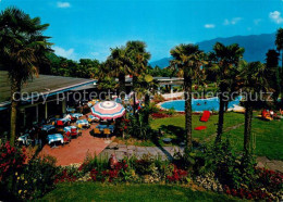 13224026 Locarno TI Ferienparadies Hotel Losone Swimming Pool Palmen Locarno TI - Otros & Sin Clasificación