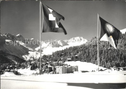 11637488 Arosa GR Dorfblick Flaggen Arosa - Sonstige & Ohne Zuordnung