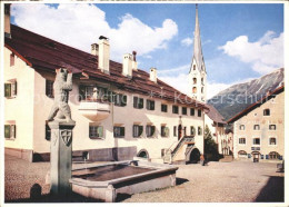 11637332 Zuoz GR Dorfplatz Brunnen Kirche Zuoz - Sonstige & Ohne Zuordnung