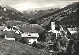 11635678 Luzein Ortsansicht Mit Kirche Panorama Blick Gegen Silvrettagruppe Luze - Other & Unclassified