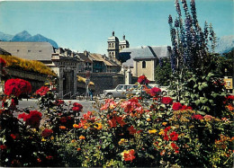 05 - Briançon - La Collégiale - Automobiles - Fleurs - CPM - Voir Scans Recto-Verso - Briancon