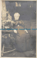 R062050 Old Postcard. Woman Near The Table - World
