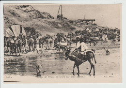 EL OUTAYA - ALGERIE - PASSAGE DE L'OUED EL OUTAIA PAR UNE CARAVANE - Altri & Non Classificati