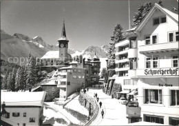 11631121 Arosa GR Strassenpartie Mit Kirche Und Hotel Schweizerhof Arosa GR - Sonstige & Ohne Zuordnung