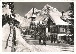 11631112 Arosa GR Strassenpartie Mit Pferdeshlitten Und Kirchturm Arosa GR - Sonstige & Ohne Zuordnung