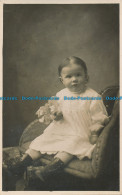 R063960 Old Postcard. Little Girl On The Chair. E. E. Prangnell - World