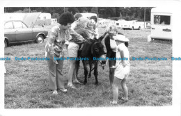 R067393 Old Postcard. Little Girl On The Donkey - World