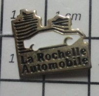 912B Pin's Pins / Beau Et Rare / AUTOMOBILES / GARAGISTE LA ROCHELLE AUTOMOBILE - Other & Unclassified