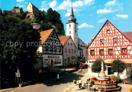 72991166 Pottenstein Oberfranken Marktplatz Brunnen Fachwerkhaeuser Kirche Burg  - Pottenstein