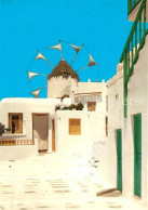 72974249 Mykonos Ortspartie Mit Windmuehle MyKonos - Grèce