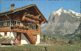 12467126 Grindelwald Berghaus Mit Blick Zum Wetterhorn Grindelwald - Autres & Non Classés