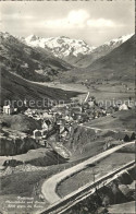 12334666 Andermatt Oberalpbahn Mit Strasse Gegen Furka Andermatt - Other & Unclassified