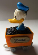 ANCIENNE FIGURINE DISNEY DONALD DANS UN WAGON DE MINE 6 CM - Disney