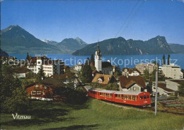 12053906 Vitznau Ortsansicht Mit Kirche Rigi Bahn Eisenbahn Buergenstock Stanser - Andere & Zonder Classificatie