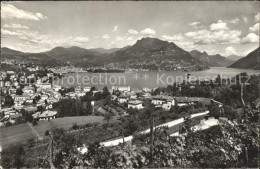 12047576 Lugano TI Panorama Lago Di Lugano Luganersee Alpen Lugano - Autres & Non Classés