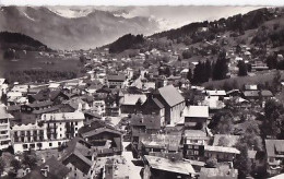 EN AVION AU DESSUS DE....  MEGEVE             Vue Générale    + Flamme De Sallanches - Megève