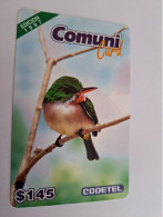 DOMINICAANSE REPUBLIK RD $14,-  EDICION 1997/ COMUNI /CODETEL BIRD ON TREE     PREPAID        MINT CARD   ** 16647 ** - Dominicaanse Republiek