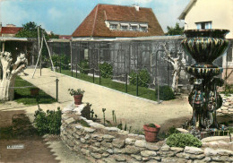 COURSEULLES SUR MER . Jardin Et Volières De La Maison Leclerc - Courseulles-sur-Mer